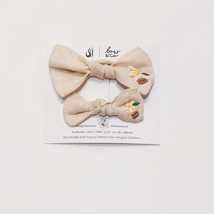 linen embroidered bows
