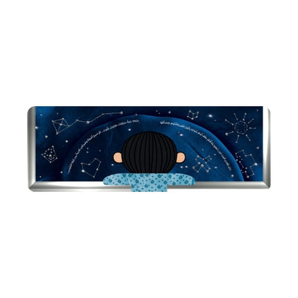 A rectangular desk mat with rounded corners featuring a cartoon illustration of a child with black hair looking up at a starry night sky with constellations. The desk mat has a dark blue space background, white star details, and a light blue patterned edge.