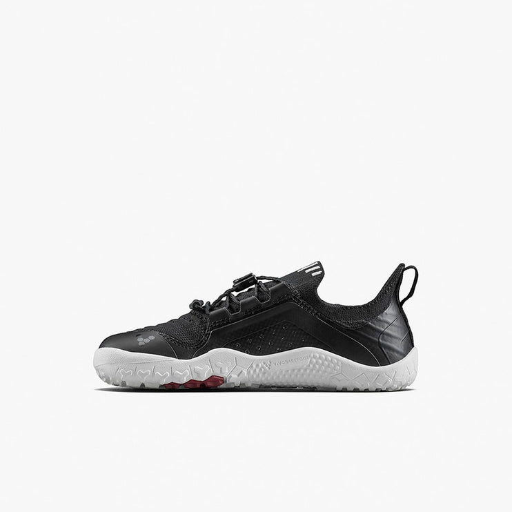 Black sneaker with white sole