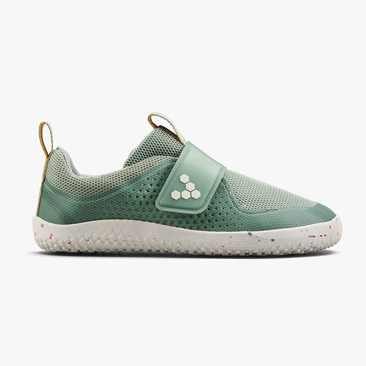 Green children's shoe with a velcro strap on