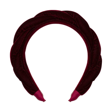 Maroon velvet headband on a white background