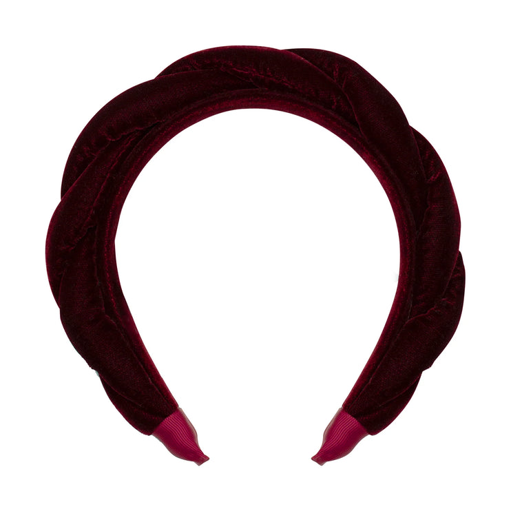 Maroon velvet headband on a white background