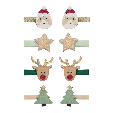 Set of Christmas-themed hair clips including Santa, reindeer, and tree designs on a white background.