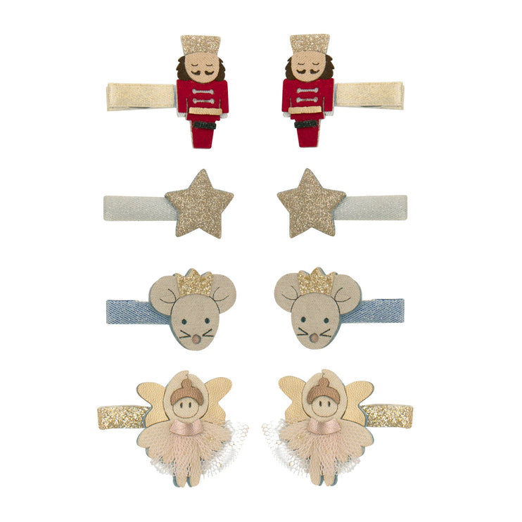 Set of mini hair clips featuring Nutcracker, Mouse King, and Fairy designs on a white background.