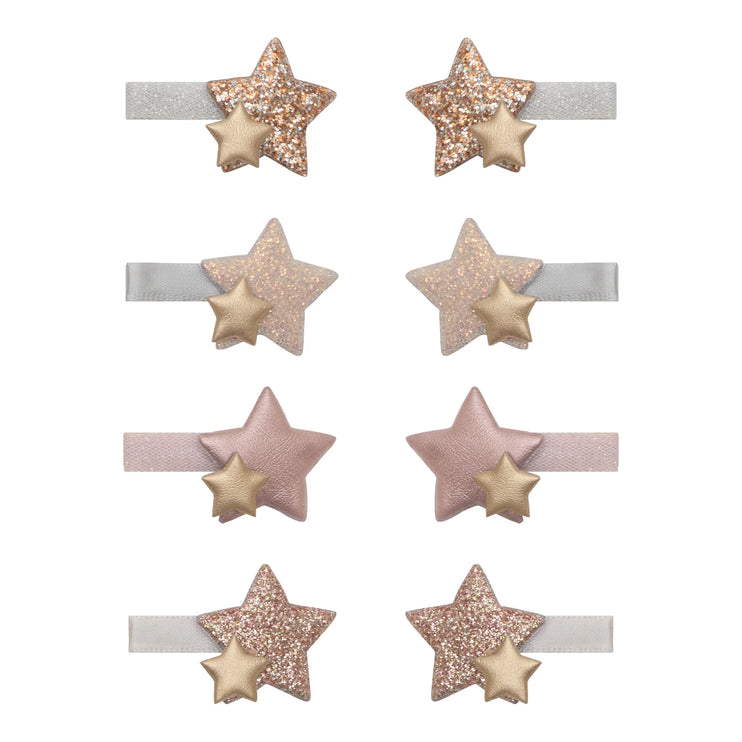 Set of six star-shaped hairbands with glittery stars on a white background