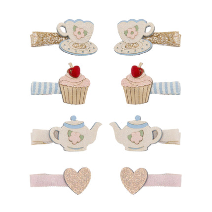 A set of six pastel-themed hair clips featuring teacups, cupcakes, teapots, and glittery hearts 