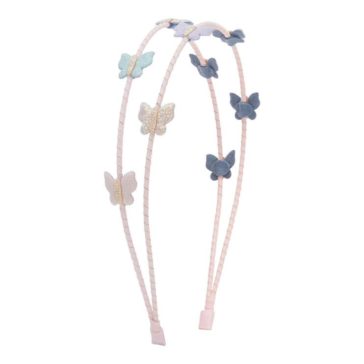 A double-strand light pink braided headband with butterfly charms in pastel blue, lavender, and glittery gold