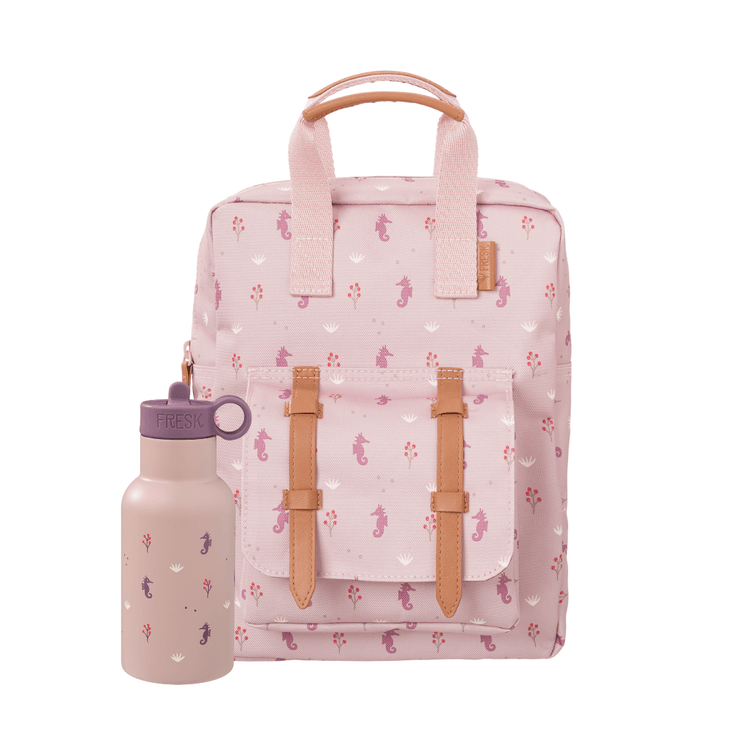 Pink backpack with seahorse pattern and matching water bottle