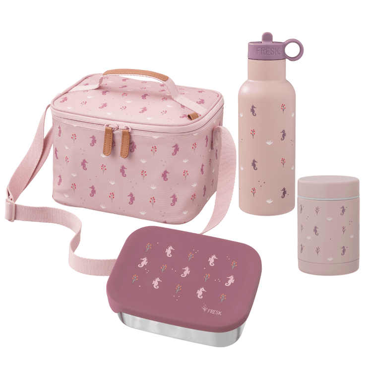 Pink lunch bag, bottle, and container set with a seahorse pattern on a white background