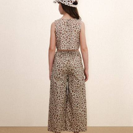 Leopard print outfit with wide-leg pants and a sleeveless top 