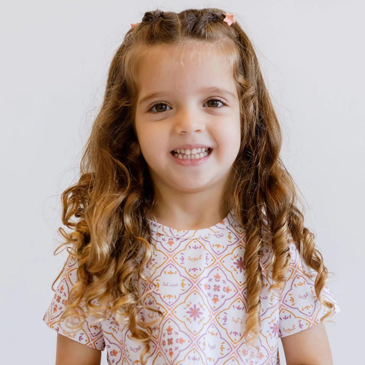 Girl wearing Arabesque Dress