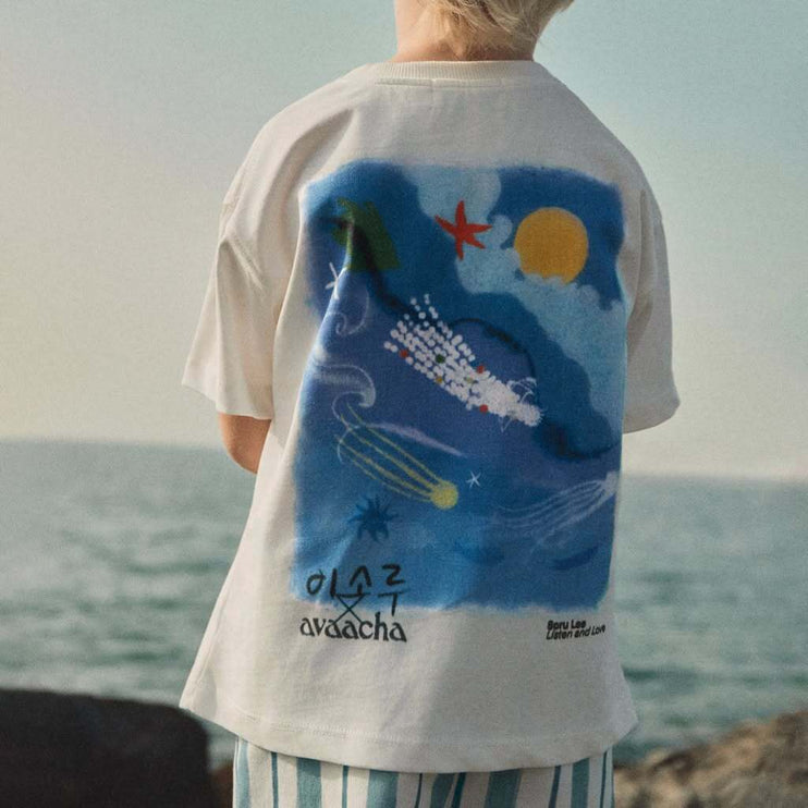 a kid wearing a t-shirt with a unique illustration