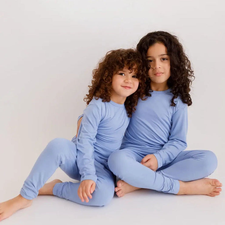 Siblings in matching Bahry long sleeve pajama