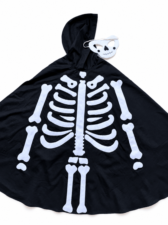Black hooded skeleton costume cape with a white printed rib cage, spine, and bones, shown on a white background with a small white skull mask attached near the hood.