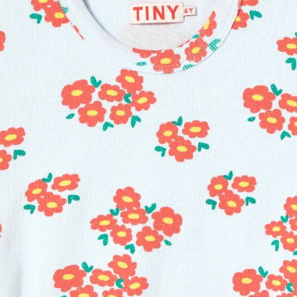 Children's shirt with floral pattern and 'TINY' branding 