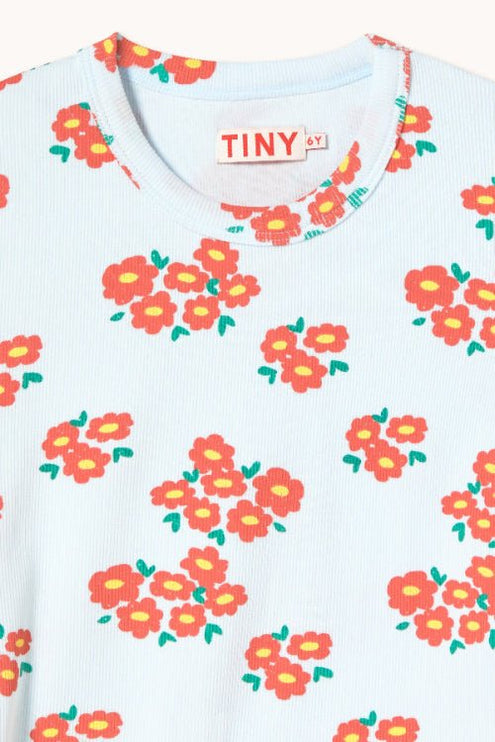 Children's shirt with floral pattern and 'TINY' branding 