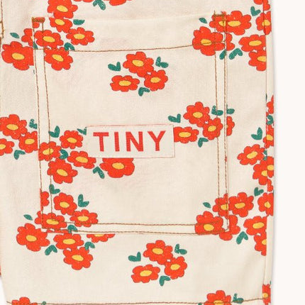 Off-white romper short with blossoms and tiny print