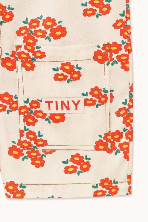Off-white romper short with blossoms and tiny print