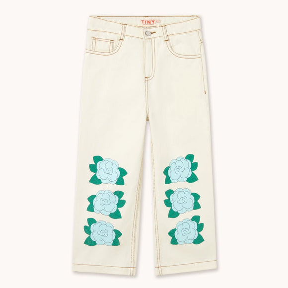 Off White jeans with blue flowers on the legs
