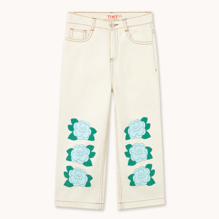 Off White jeans with blue flowers on the legs