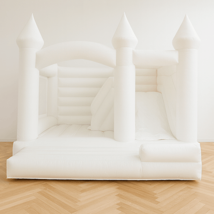White inflatable bouncy castle with slide