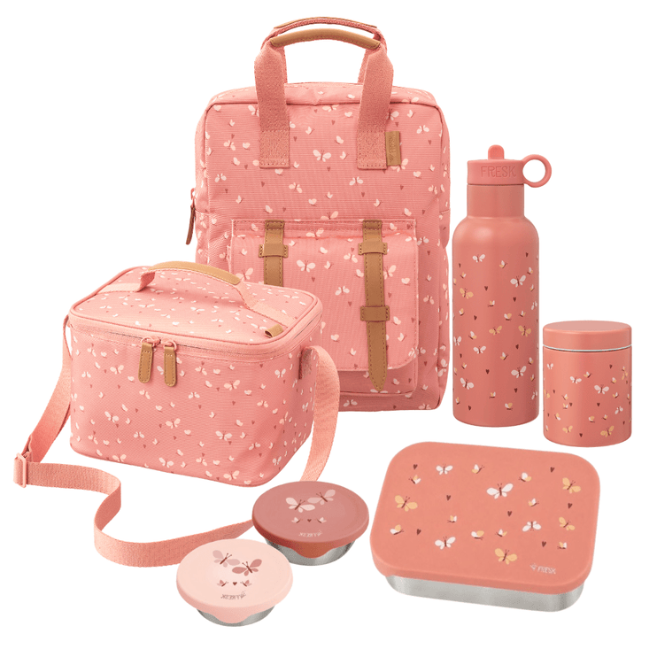A coordinated pink picnic/lunch set on a white background, including a large backpack, a cooler bag, a water bottle, a lunch box with lid, a thermos food jar, and two snack boxes. The items have a soft pink base with a small white and tan butterfly print.