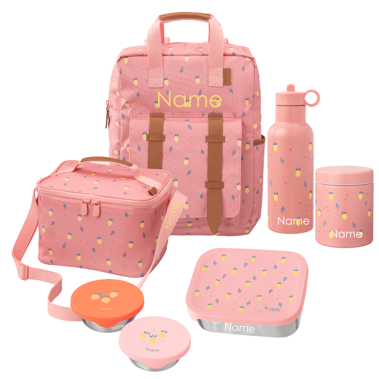 A coordinated pink school set including a large backpack, a cooler bag, a water bottle, a lunch box with lid, a thermos food jar, and two snack boxes. The set has a small repeating fruit print. All items are personalizable.