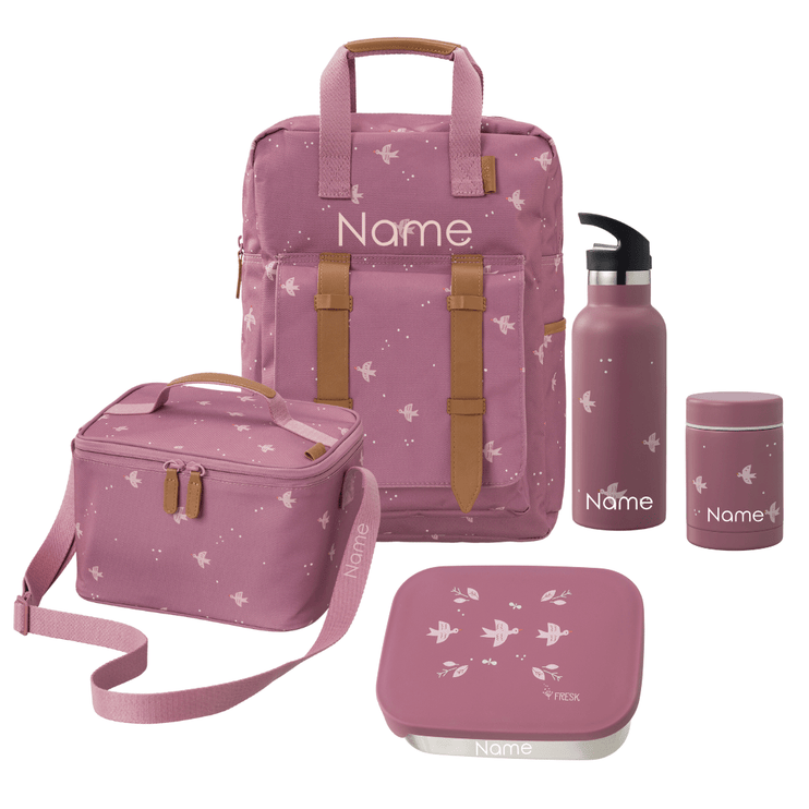 Pink backpack with matching lunch box, bottle, and container