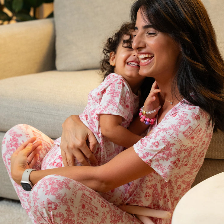 matching kids and adults pajamas in princess pattern