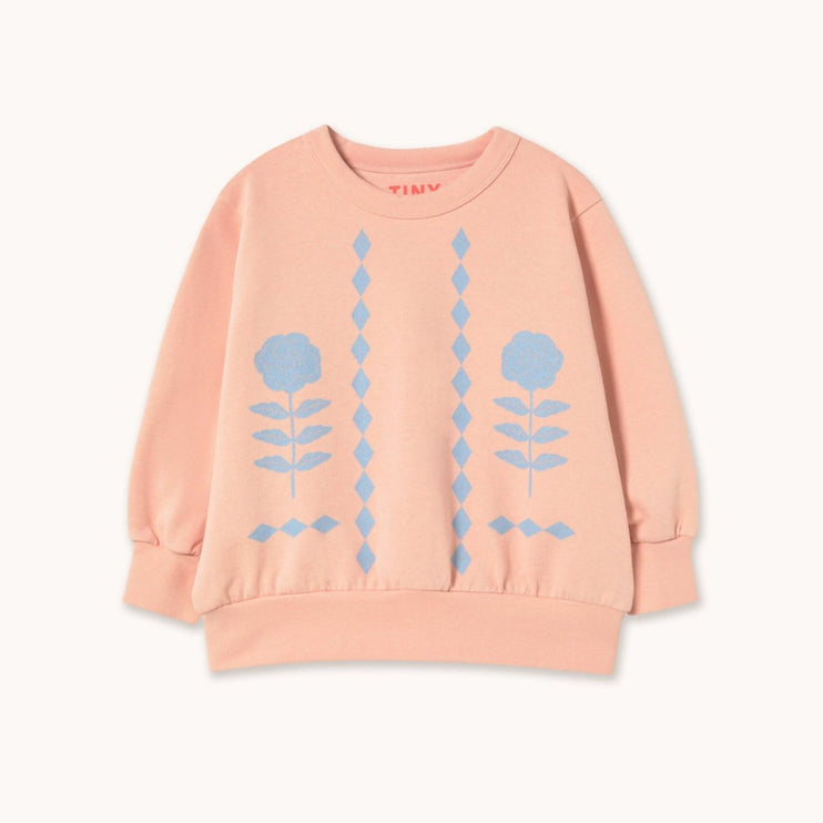 Pink sweatshirt with blue floral patterns