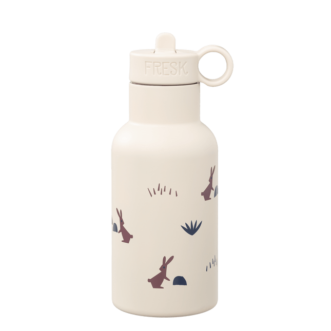 White water bottle with rabbit illustrations on a white background