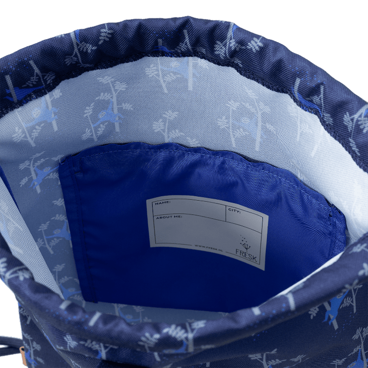 Inside of the blue swim bag with monkey print