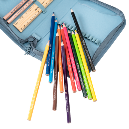Colorful pencils and a ruler on a blue pencil case 