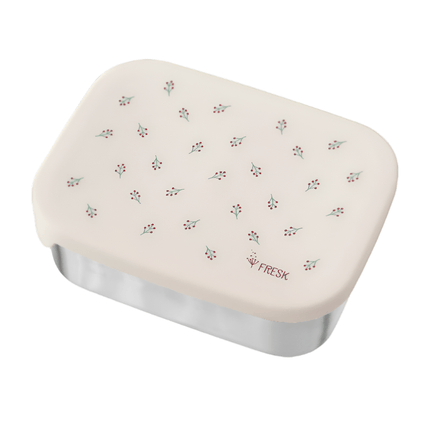 Rectangular stainless steel lunchbox with a light beige lid featuring a delicate pattern of small red berries and green leaves. The word "FRESK." is printed in light brown on the bottom right of the lid.