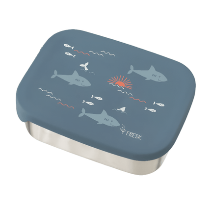 Blue rectangular lunchbox with a stainless steel base and a lid decorated with sharks, small fish, waves, and a setting sun. The word "FRESK." is printed in white on the bottom right corner of the lid.