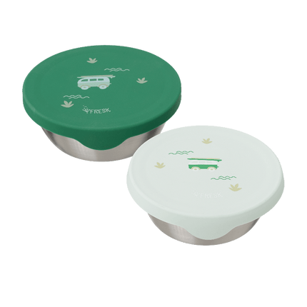 Two stainless steel containers with green and white lids
