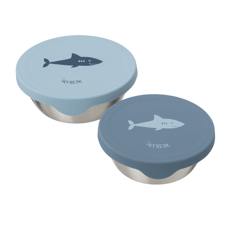 Two blue containers with shark print on lids 