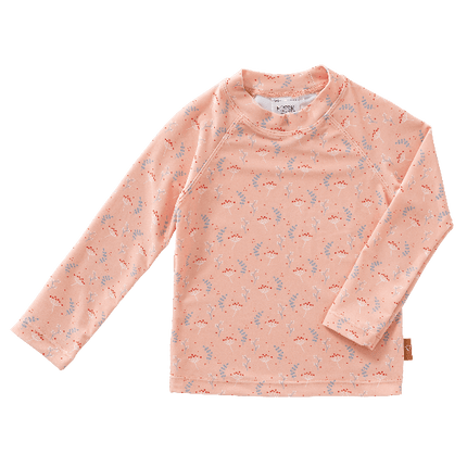 Peach long sleeve swim top for girls with UV protection 50, made from eco-friendly recycled nylon keeping your little one safe, comfy, and stylish at the beach or pool.
