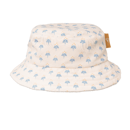 Cream-blue floral print eco-friendly UV Fresk reversible bucket hat for girls made from recycled nylon with soft terry lining and a secure chin cord—providing comfy, stay-put sun protection.
