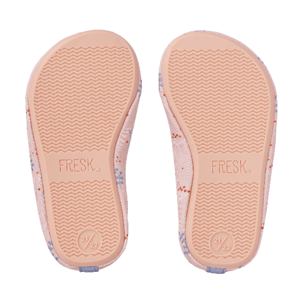 Peach swim shoes for girls with a flexible, grippy sole, reinforced toes, elastic fit, and fast-drying UPF50 fabric—perfect for sun-safe beach, pool, or indoor play.