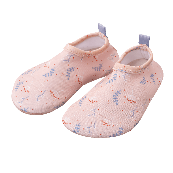 Peach swim shoes for girls with a flexible, grippy sole, reinforced toes, elastic fit, and fast-drying UPF50 fabric—perfect for sun-safe beach, pool, or indoor play.