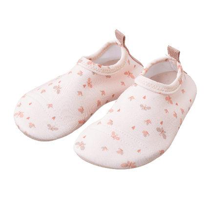 Cream with butterfly print swim shoes for girls with a flexible, grippy sole, reinforced toes, elastic fit, and fast-drying UPF50 fabric—perfect for sun-safe beach, pool, or indoor play.