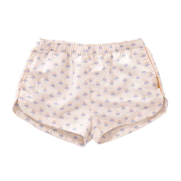 Peach with blue floral print swim shorts for girls made from eco-friendly recycled nylon, with UV Protection 50 and an adjustable drawstring—perfect for safe, comfy, and stylish beach fun.
 