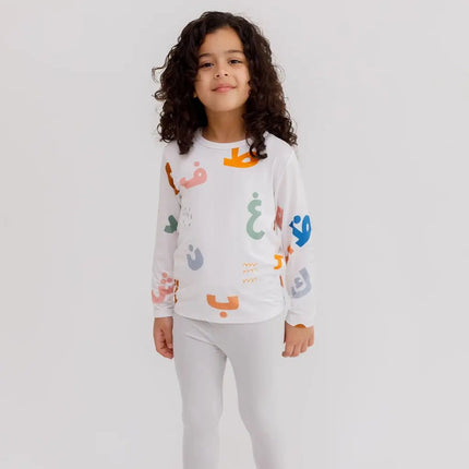 Child wearing Huroof long sleeve pajama