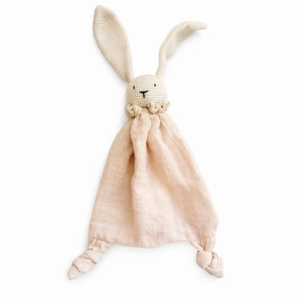 Knitted bunny plush toy with a beige blanket on a white background