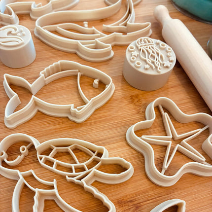 A set of  cutters and a matching stamp 