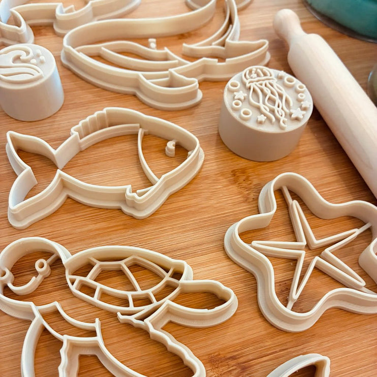 A set of  cutters and a matching stamp 
