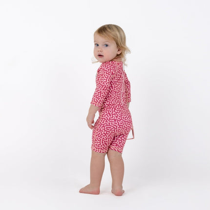 side angle of the baby swimsuit coral reef