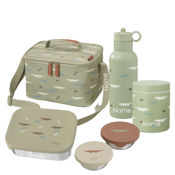 A lunch set featuring a beige insulated lunch bag, a matching water bottle, a jar, and a bento box, all decorated with a shark pattern on a white background.