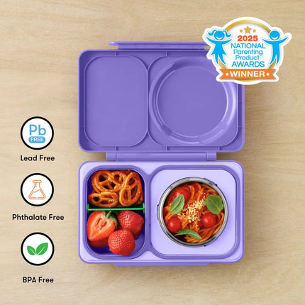 Purple bento box with compartments filled with snacks 